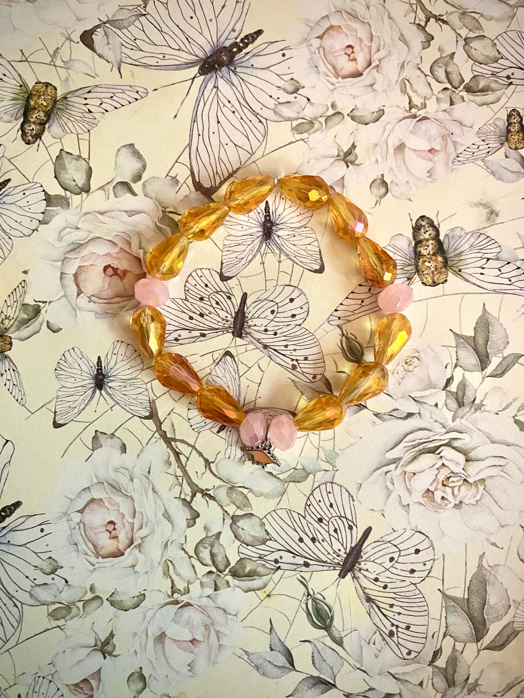 Pink and Yellow Stegasaurus Charm Bracelet