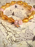 Pink and Yellow Stegasaurus Charm Bracelet